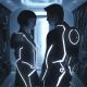 Olivia Wilde and Garrett Hedlund in a scene from “TRON: Legacy”