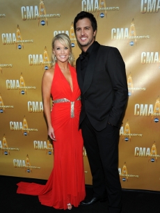 Luke Bryan and his wife attend the 44th Annual CMA Awards at the Bridgestone Arena in Nashville, Tennessee, on November 10, 2010 
