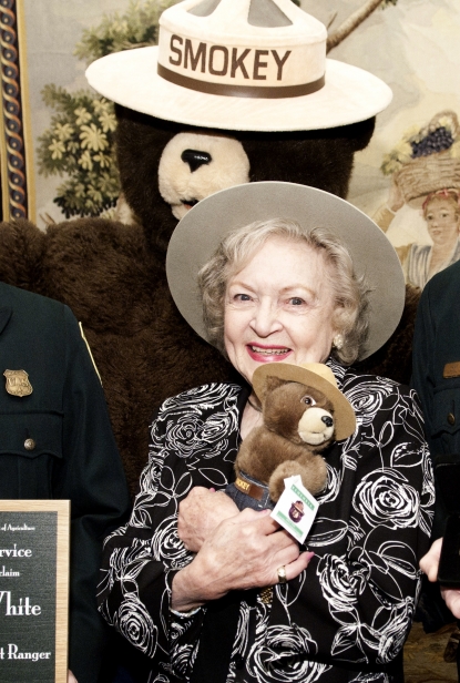 Betty White poses for photographers after she named a honorary Forest Ranger outside of the John F. Kennedy Center for the Performing Arts in Washington, DC. on November 9, 2010 