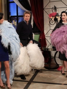 Dita Von Teese shows Kit Hoover some of her best burlesque moves on Access Hollywood Live on November 15, 2010