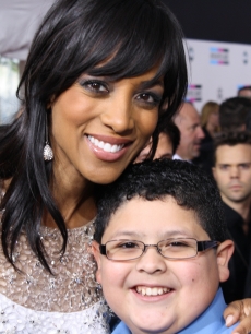 Access Hollywood’s Shaun Robinson with “Modern Family’s Rico Rodriguez at the 2010 American Music Awards held at Nokia Theatre L.A. Live in Los Angeles on November 21, 2010