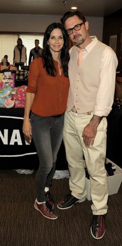 Courteney Cox and David Arquette come together for the Old Navy Rock + EBowl event to benefit EBMRF on November 13, 2010 in Los Angeles