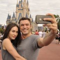 Brian Austin Green and Megan Fox take a souvenir photo Disney World in Lake Buena Vista, Florida on November 26, 2010 