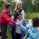 Former Alaska Gov. Sarah Palin shakes hands with Gosselin twins, Cara and Mady, as their mother Kate Gosselin looks on as the Palins and the Gosselins go on a camping trip in Coffee Creek, Alaska, during a taping of “Sarah Palin’s Alaska.”