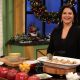 Susan Spungen shows off her “Eat Pray Love” treats for Access Hollywood Live on December 10, 2010