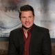 Nick Lachey is all smiles on the set of Access Hollywood Live on December 13, 2010