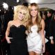 Kelly Osbourne and singer Miley Cyrus arrive at the 2010 American Music Awards held at Nokia Theatre L.A. Live in Los Angeles on November 21, 2010