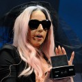 Lady Gaga displays the GL30 Instant Digital Camera as she unveils the Polaroid Grey Label of products she co-designed at the 2011 International Consumer Electronics Show at the Las Vegas Convention Center January 6, 2011.