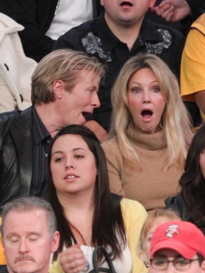 Jack Wagner & Heather Locklear check out the action at the Philadelphia 76ers and the Los Angeles Lakers game at Staples Center on December 31, 2010 in Los Angeles