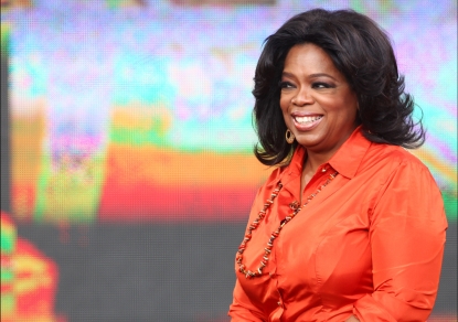 Oprah Winfrey looks out from the set during the taping of the “Oprah Winfrey Show” at the Sydney Opera House on December 14, 2010 in Sydney, Australia