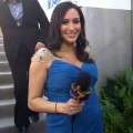 AccessHollywood.com’s Laura Saltman poses on the red carpet of the 2011 Golden Globes in Hollywood