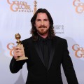 Christian Bale poses with his award for Best Performance by an Actress In A Supporting Role in a Motion Picture for “The Fighter” in the press room at the 68th Annual Golden Globe Awards held at The Beverly Hilton hotel on January 16, 2011 in Beverly Hills
