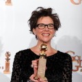 Annette Bening poses with her award for Best Performance by an Actress in a Motion Picture (Musical Comedy) for “The Kids Are All Right” in the press room at the 68th Annual Golden Globe Awards held at The Beverly Hilton hotel in Beverly Hills on January 16, 2011 