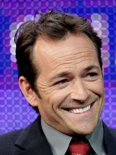Luke Perry speaks during the “Goodnight for Justice” panel at the Hallmark Movie Channel portion of the 2011 Television Critics Association Winter 2011 at the Langham Hotel, Pasadena, Jan. 7, 2010