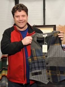 Sean Astin checks out his new vest by What Goes Around Comes Around Vintage-inspired Apparel