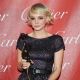 Carey Mulligan poses backstage with the ‘Breakthrough Performance Award’ during the 22nd Annual Palm Springs International Film Festival Awards Gala in Palm Springs, California on January 8, 2011