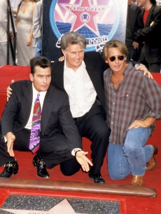 Charlie Sheen, Martin Sheen and Emilio Estevez celebrate Charlie receiving a star on the Walk of Fame, Hollywood, Sept. 23, 1994