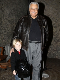 James Earl Jones poses with six year-old Max Page (star of Volkswagen’s Darth Vader themed Super Bowl commercial) backstage at “Driving Miss Daisy” on Broadway at the Golden Theatre in New York City on February 7, 2011 