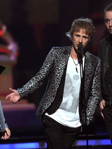 Matthew Bellamy, Christopher Wolstenholme and Dominic Howard of Muse accept an award onstage during The 53rd Annual Grammy Awards held at the Staples Center in Los Angeles, Calif., on February 13, 2011