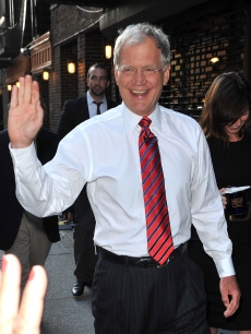 David Letterman greets fans outside “The Late Show with David Letterman” at the Ed Sullivan Theater, NYC, June 21, 2010