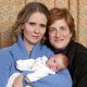 Cynthia Nixon and Christine Marinoni pose with their son Max on February 11, 2011 in New York City
