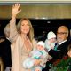 Celine Dion waves to fans as she holds her son Nelson Angelil next to her husband and manager Rene Angelil, holding their son Eddy Angelil, and their son Rene-Charles Angelil at Caesars Palace in Las Vegas on February 16, 2011 