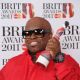 Cee Lo Green hits the red carpet with his award for Best International Male Solo Artist at the BRIT Awards 2011 at the O2 Arena in London on February 15, 2011
