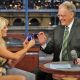 Paris Hilton shows David Letterman part of the Paris Hilton App for a smart phone that allows photographed subjects to appear in a picture with her on the “Late Show with David Letterman,” on Feburary 17, 2011
