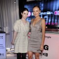 Michelle Trachtenberg and Malin Akerman smile while checking out the LG Cinema 3D HDTV
