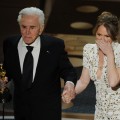 Presenter Kirk Douglas shakes hands with Melissa Leo after Leo wins the Best Actress in a Supporting Role Oscar for “The Fighter” during the 83rd Annual Academy Awards held at the Kodak Theatre, Hollywood, Calif., on February 27, 2011