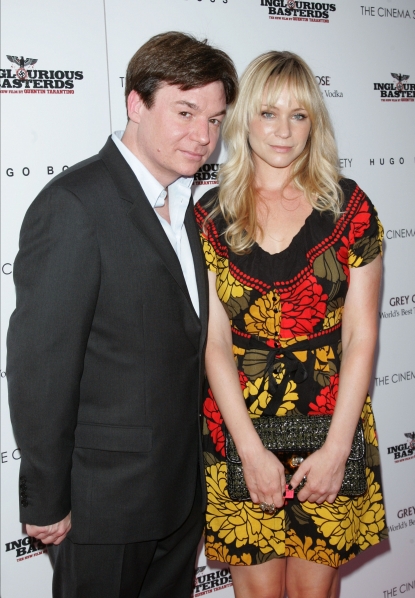 Mike Myers and Kelly Tisdale attend The Cinema Society & Hugo Boss screening of “Inglourious Basterds” at SVA Theater in New York City on August 17, 2009