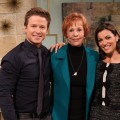 Carol Burnett poses with Access Hollywood Live hosts Billy Bush and Kit Hoover on March 24, 2011