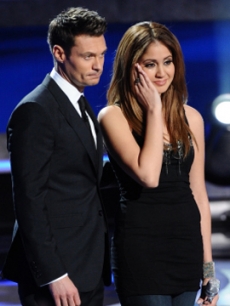 Karen Rodriguez and Ryan Seacrest on the “American Idol” stage on March 17, 2011