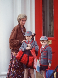 Prince William is all geared up for school in this photo taken outside the Wetherby School with his mother, Princess Diana, and his brother, Prince Harry, in April 1990 