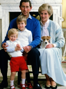 Prince William poses in an early family photograh with his father, Prince Charles, mother, Princess Diana, and brother, Prince Harry, at home in Kensington Palace in December 1986