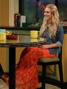 AnnaSophia Robb talks with Kit Hoover and guest host Lisa Rinna about her role in “Soul Surfer” on Access Hollywood Live on March 30, 2011   