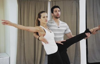 Dmitry Chaplin helps Petra Nemcova stretch out during “Dancing with the Stars” rehearsals