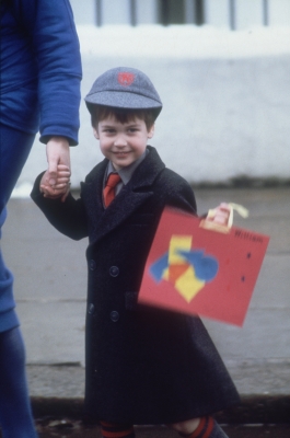 Prince William is all smiles on his first day of school in London on January 15, 1987 