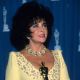 Elizabeth Taylor poses with her Oscar at the 65th Annual Academy Awards at the Shrine Auditorium in Los Angeles on March 29, 1993 