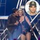 Robin Roberts joins Britney Spears onstage after her “Good Morning America” performance, possible tourmate Enrique Iglesias(inset)
