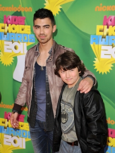 Joe Jonas and Frankie Jonas arrive at Nickelodeon’s 24th Annual Kids’ Choice Awards at Galen Center in Los Angeles on April 2, 2011