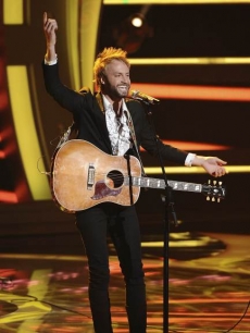 Paul McDonald sings Johnny Cash’s “Folsom River Blues” on “American Idol” on April 6, 2011