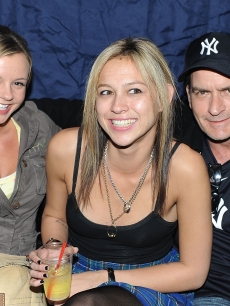 Charlie Sheen, Natalie Kenly and Bree Olson attend the a party for Charlie’s ‘Violent Torpedo Tour’ on April 8, 2011 in Carlstadt, New Jersey