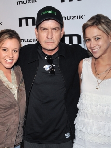 Bree Olson, Charlie Sheen and Natalie Kenly attend the official after-party for his “Torpedo of Truth” tour at Muzik on April 14, 2011 in Toronto, Canada