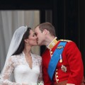 Their Royal Highnesses Prince William, Duke of Cambridge and Catherine, Duchess of Cambridge kiss on the balcony at Buckingham Palace in London on April 29, 2011