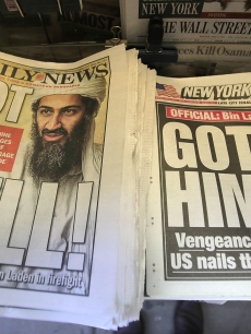 Headlines depict the death of Osama bin Laden in New York City on May 2, 2011