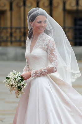 Catherine Middleton waves to the crowds before walking in to the Abbey to attend the Royal Wedding of Prince William to Catherine Middleton at Westminster Abbey in London on April 29, 2011 