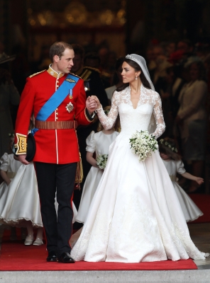 Prince William, Duke of Cambridge and Catherine, Duchess of Cambridge smile following their marriage at Westminster Abbey in London on April 29, 2011