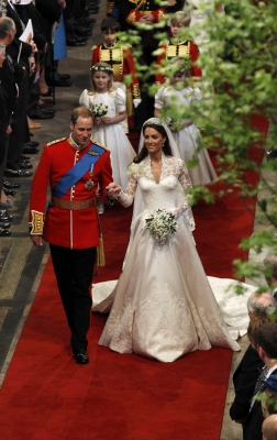 Prince William, Duke of Cambridge and Catherine, Duchess of Cambridge smile following their marriage at Westminster Abbey in London, England on April 29, 2011