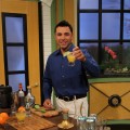 Oscar de la Hoya shows Billy Bush and Kit Hoover his favorite margarita recipe on Access Hollywood Live to celebrate Cinco de Mayo on May 5, 2011